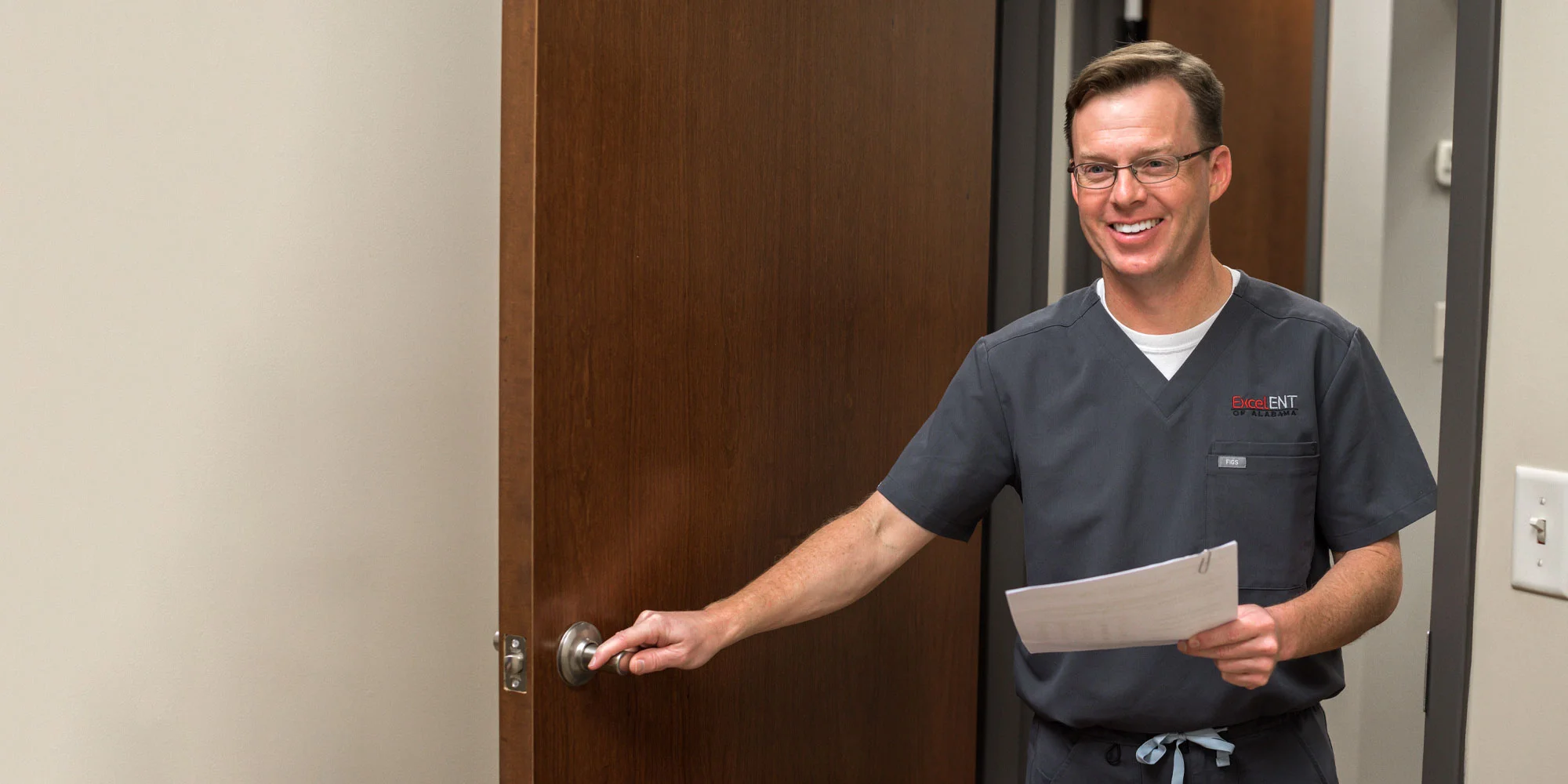 a man standing in front of a door